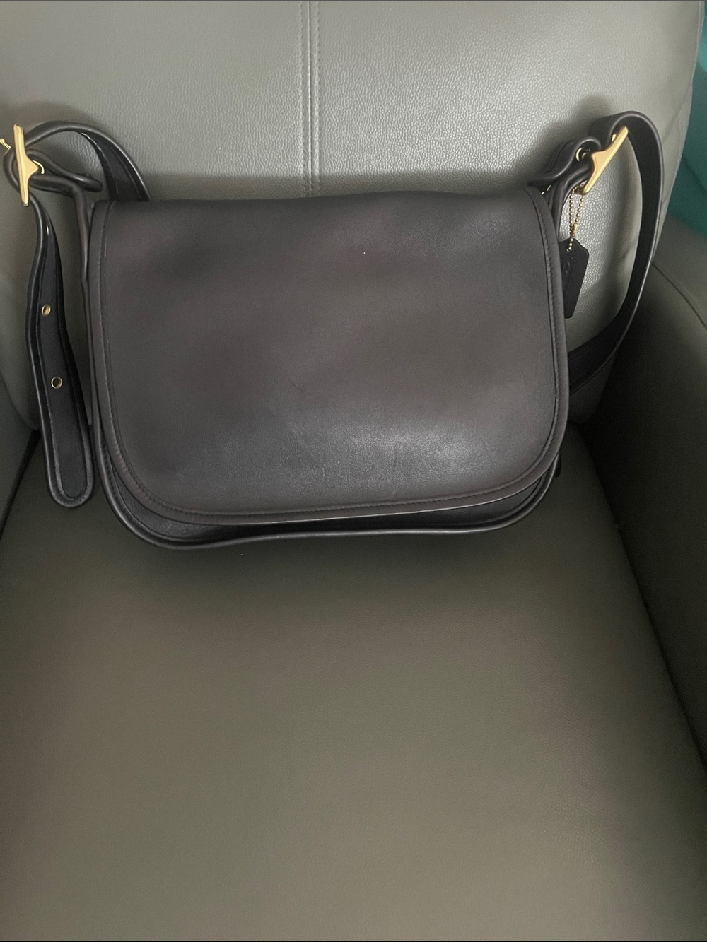 vintage black leather Coach Patricia Legacy bag with a classic flap closure and